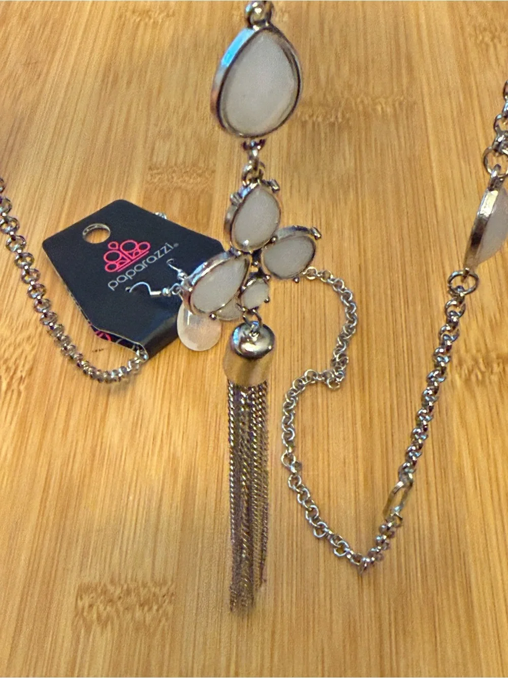 Silver Tone Tassel Pendant Necklace with White Teardrop Accents